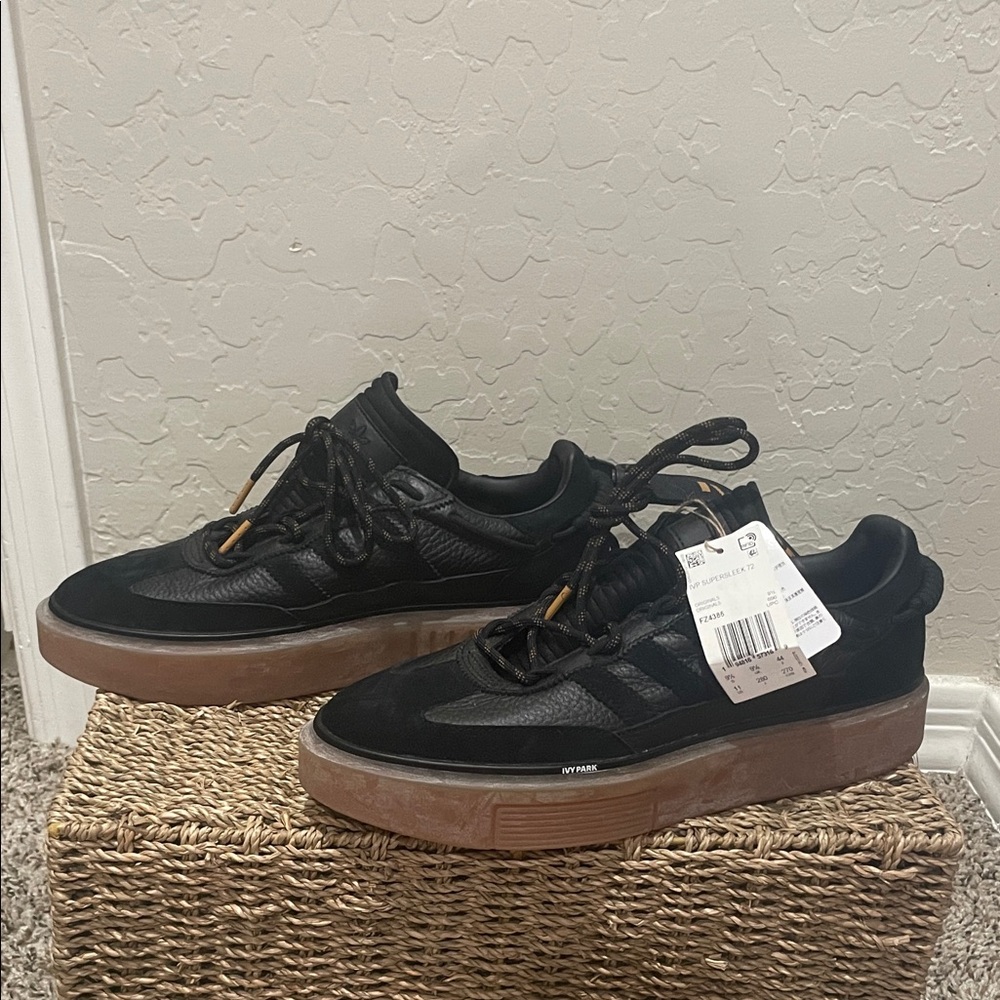 Stylish Black Sneakers with Brown Soles